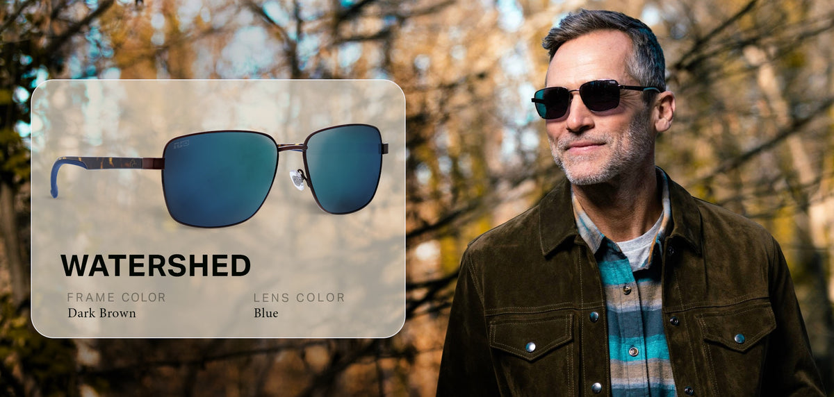 Watershed in Dark Brown with Blue lens, worn in the timber